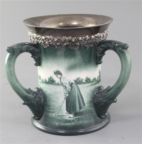 A Lenox Ceramic Art Company golf three handled mug, c.1905, height 6.5in., rim crack